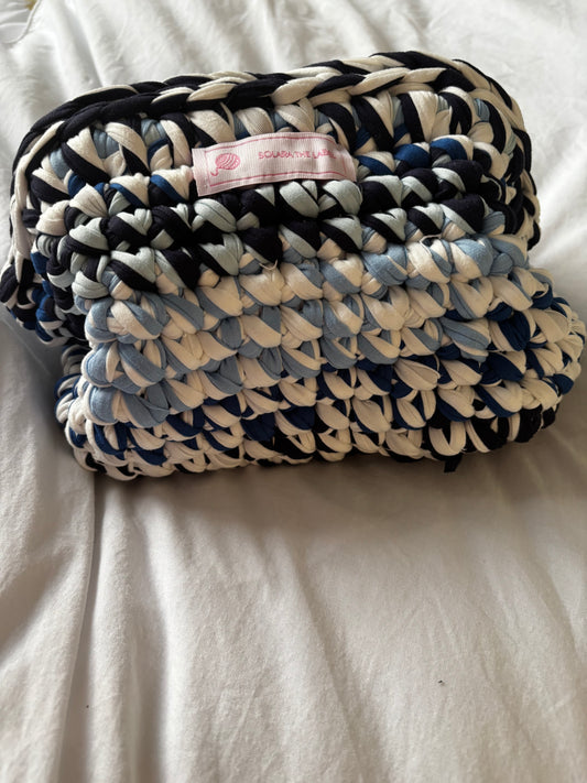 Blue mirage clutch bag